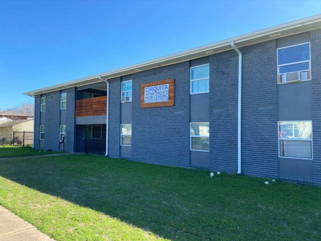 Two-story building exterior and lawn