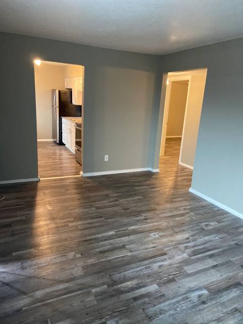 Living area with wood-style flooring