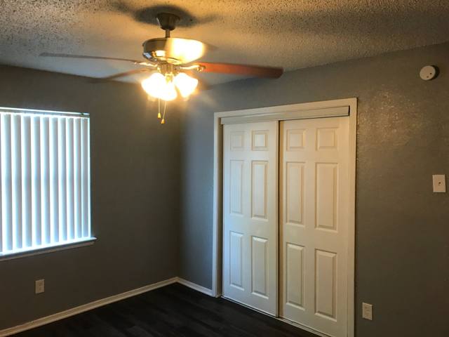 Bedroom with double closet doors