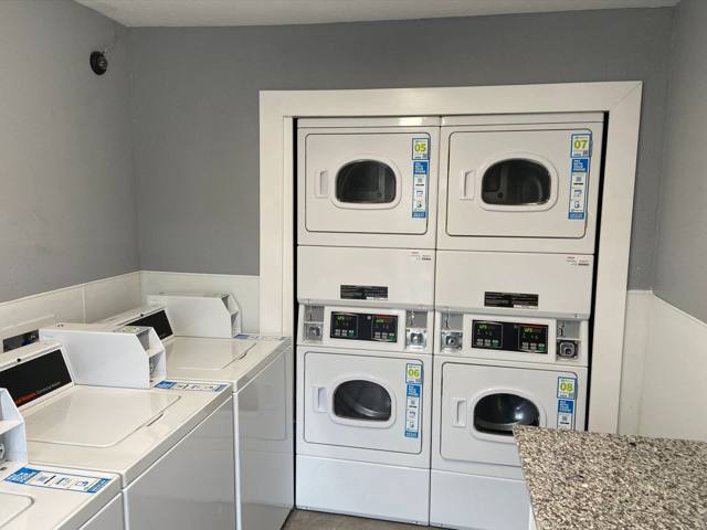 On-site laundry room with washers and dryers